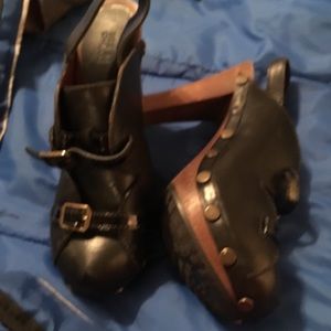 See by Chloe black leather clogs